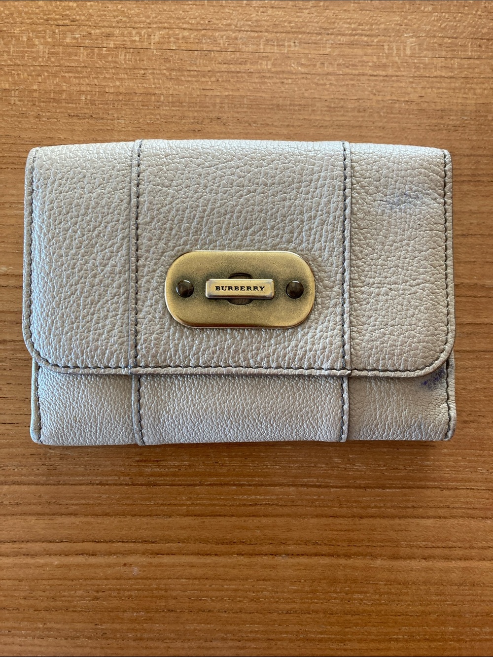 Burberry Light Gray Pebbled Leather Trifold Wallet with Gold Plaque - USED